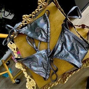 Brand new Size M reflective thong swimming suit